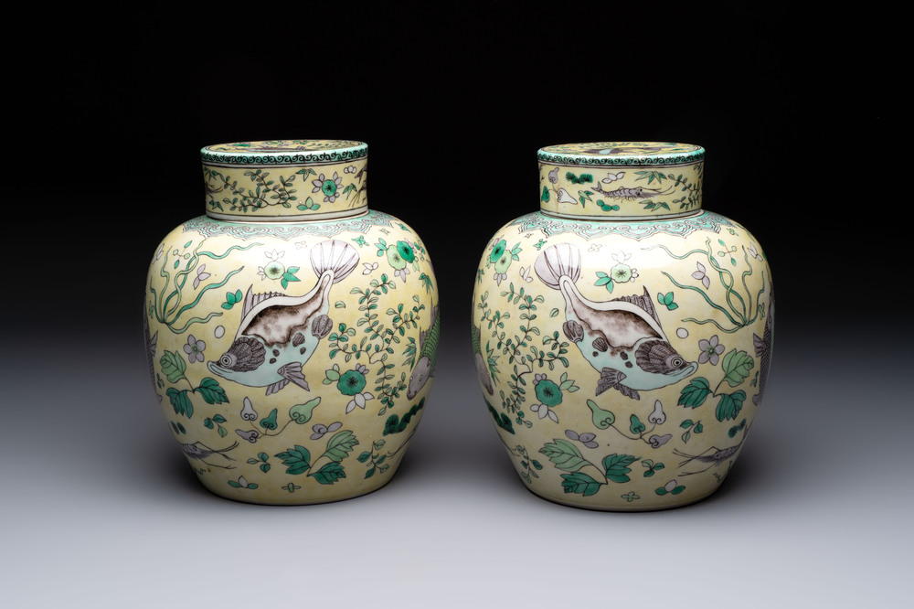 A pair of Chinese verte biscuit 'fish' jars and covers, 19th C.