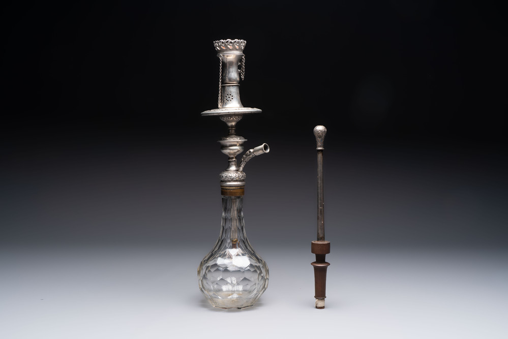 An Ottoman silver-mounted cut-glass hookah with an enamelled silver mouthpiece, 19th C.