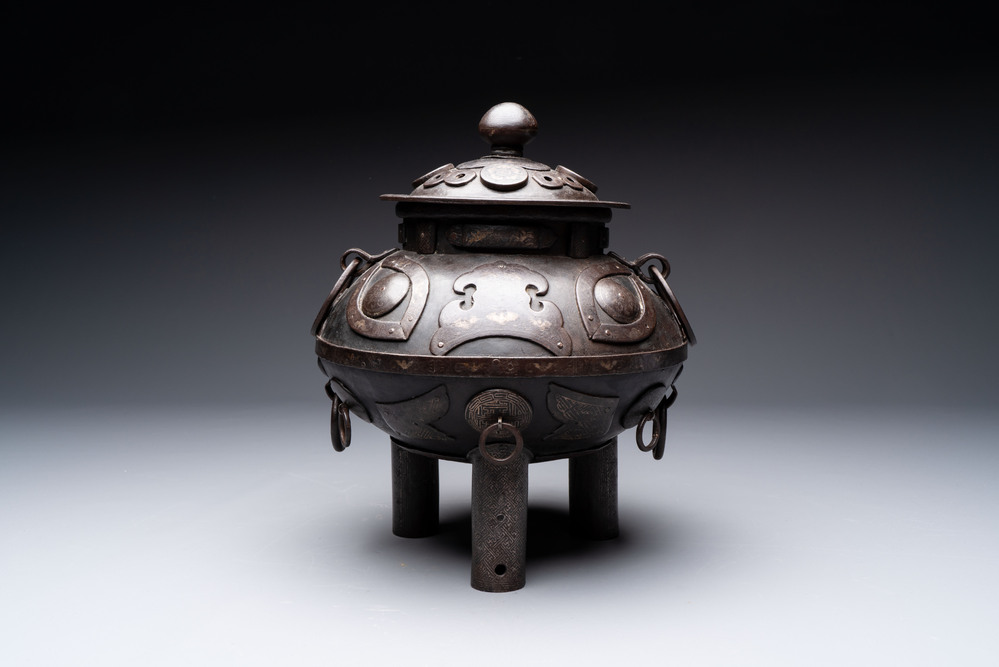An unusual Chinese gold- and silver-inlaid iron censer and cover, Xuande mark, Ming
