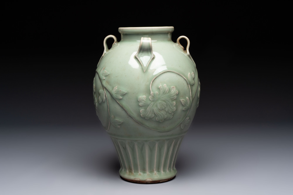 A Chinese Longquan celadon vase with floral design, Ming