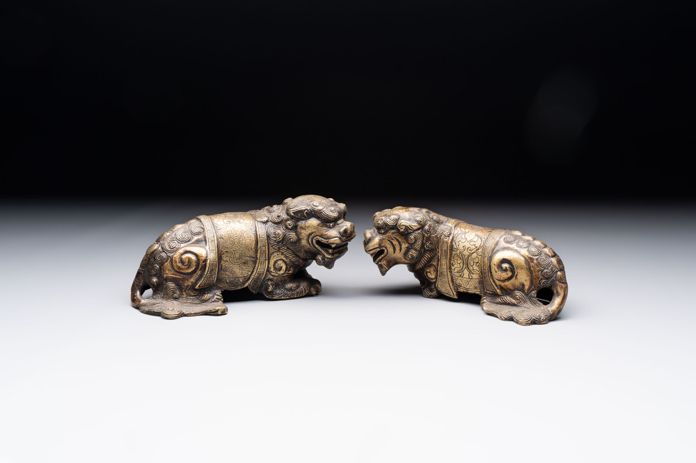 A pair of Chinese bronze Buddhist lions, 19/20th C.