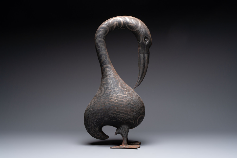 A large Qajar damascened steel bird-form sculpture, Persia, 19th C.