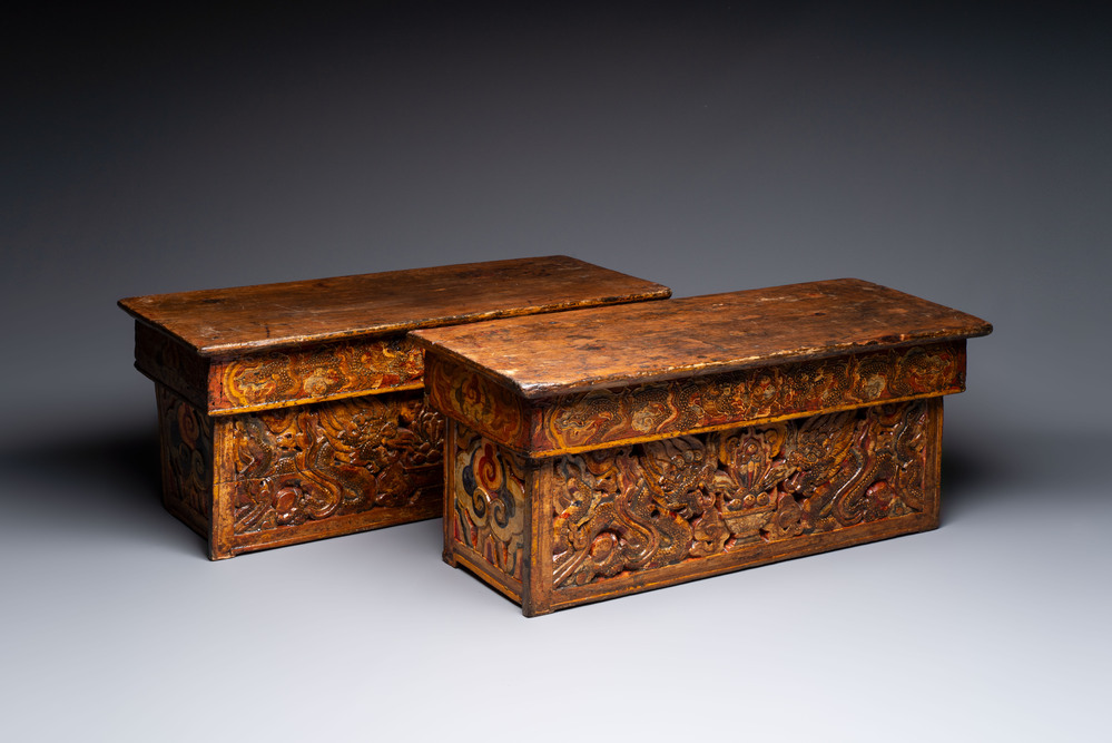 Two Tibetan polychromed wooden folding tables with dragon design, 19/20th C.