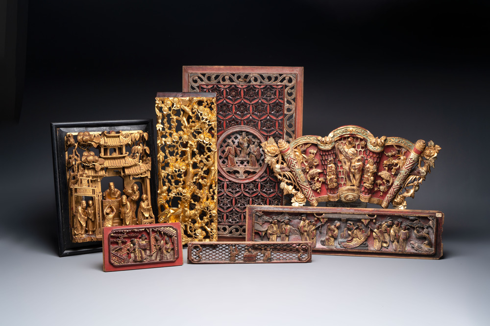 Seven Chinese gilt-lacquered carved wooden panels with narrative design, 19th C.