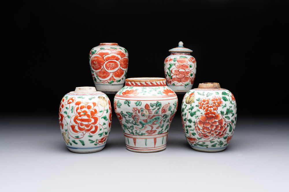 Five Chinese wucai 'Buddhist lion' and 'peony scroll' jars, Transitional period