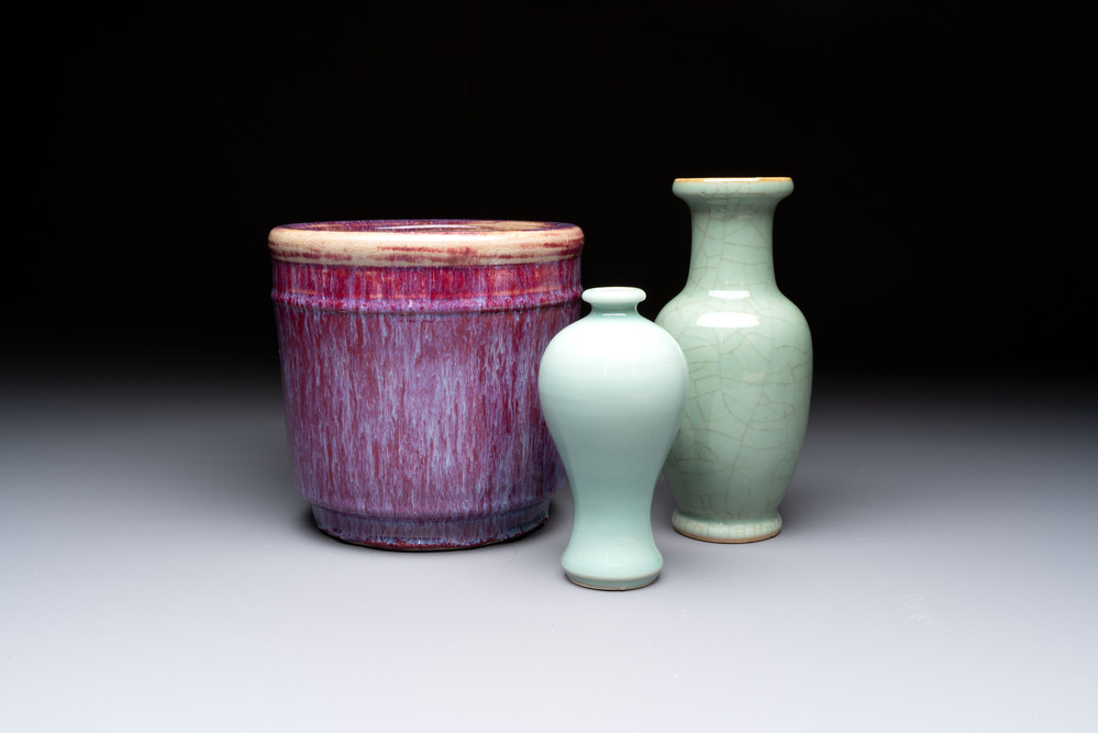 A Chinese flamb&eacute;-glazed cylindrical jardini&egrave;re and two celadon-glazed vases, 19th C.