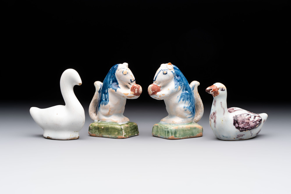 A pair of polychrome Dutch Delft miniature models of squirrels, a duck and a swan, 18th C.