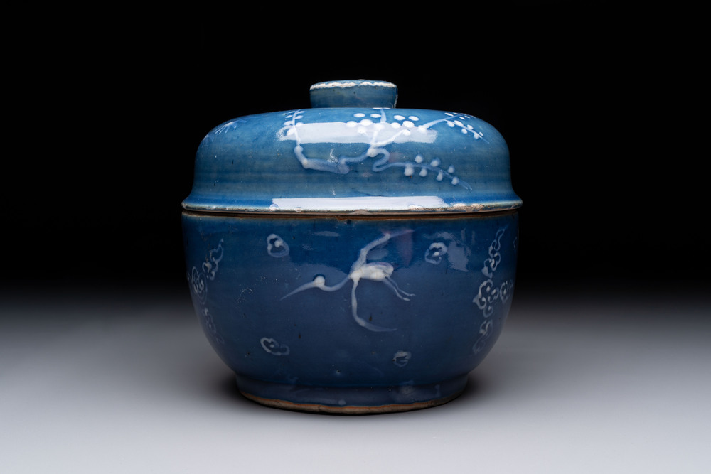 A rare Chinese Swatow white slip-decorated blue-ground bowl and cover, Ming