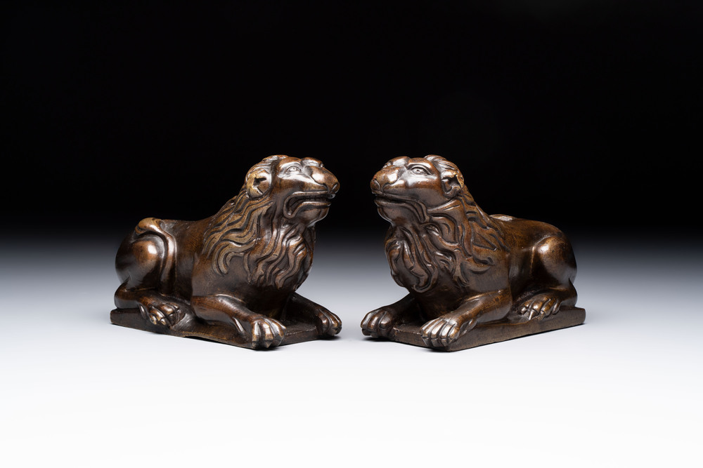A pair of reclining bronze lions, probably Dinant, 16th C.