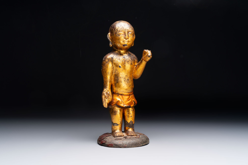 A rare and large Chinese gilt-lacquered bronze Buddha, Ming