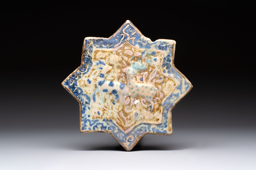 A Kashan lustre-glazed relief-moulded star tile, Iran, 13th C.