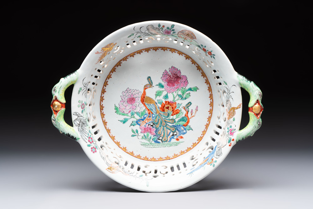 A polychrome Dutch Delft petit feu reticulated basket after a Chinese famille rose example, 18th C.