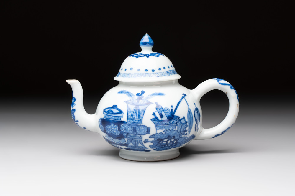 A Chinese blue and white 'antiquities' teapot and cover, Jiajing mark, Kangxi