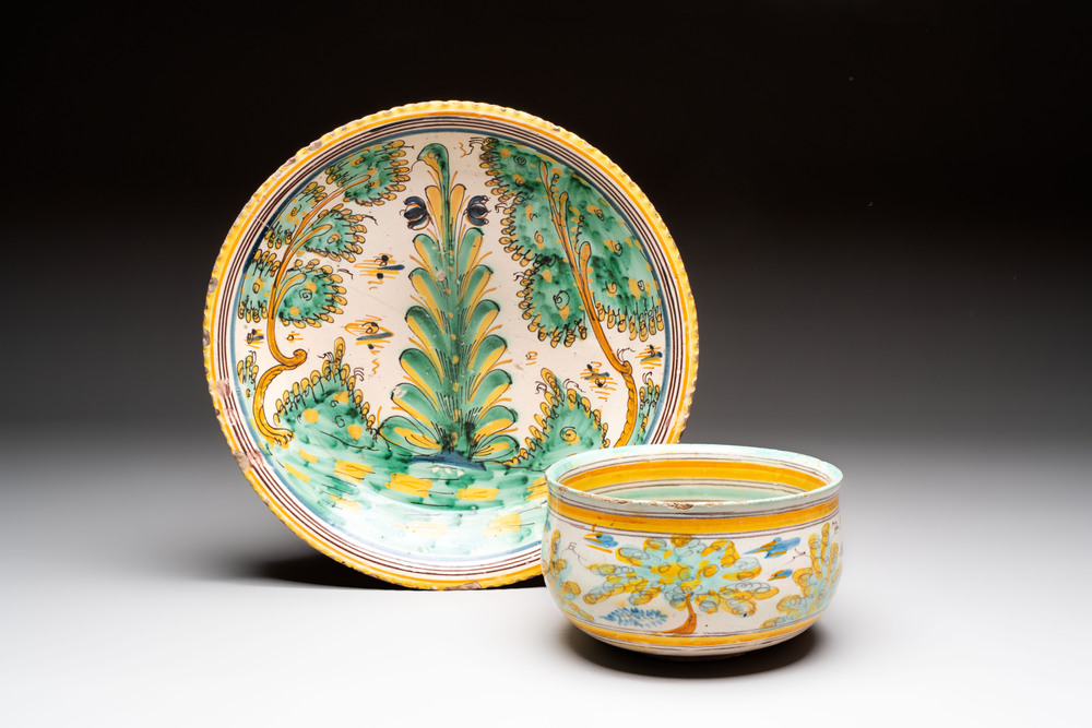 A large polychrome Spanish pottery dish and a bowl with a bird, Talavera, 18th C.