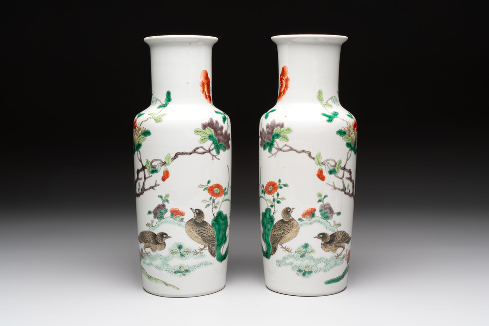 A pair of Chinese famille verte 'quails in blossoming landscape' rouleau vases, 19th C.