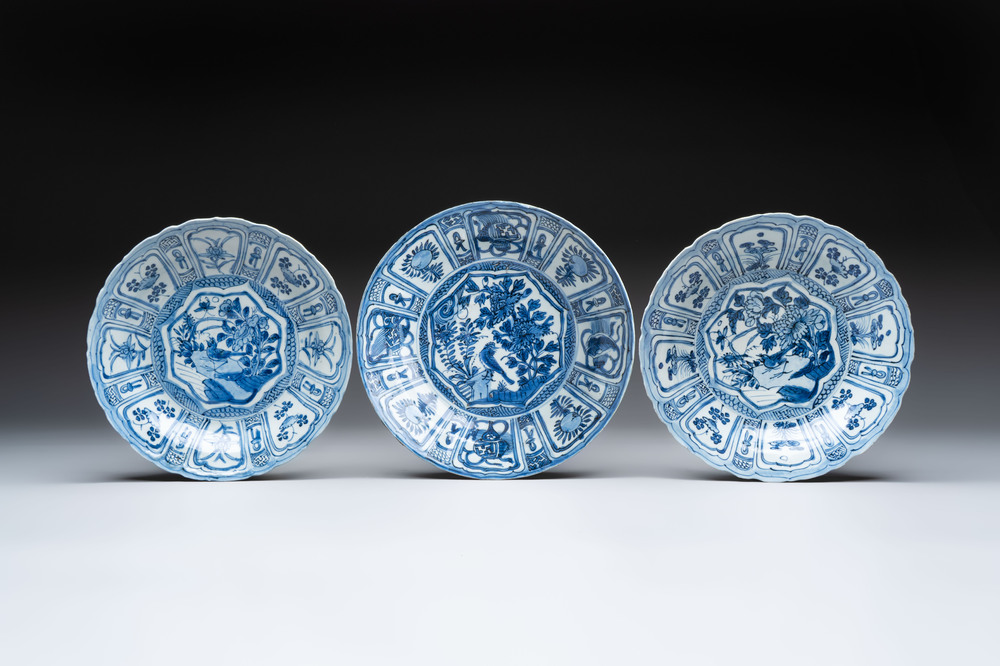 Three Chinese blue and white 'kraak' dishes with a bird and flowers, Wanli