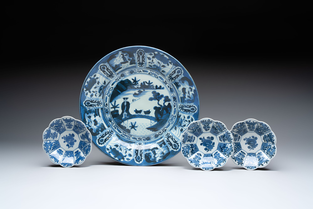 Three Japanese blue and white flower-shaped plates and a 'fisherman' dish, Edo, 17/18th C.