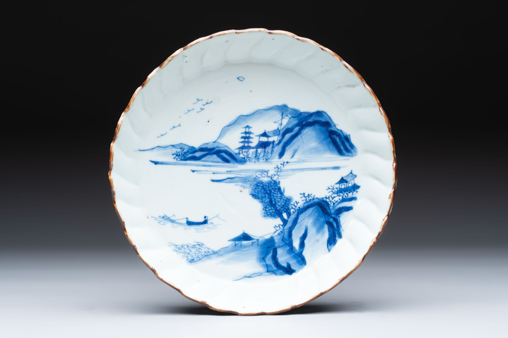 A Chinese blue and white ko-sometsuke 'riverscape' plate for the Japanese market, Chenghua mark, late Ming