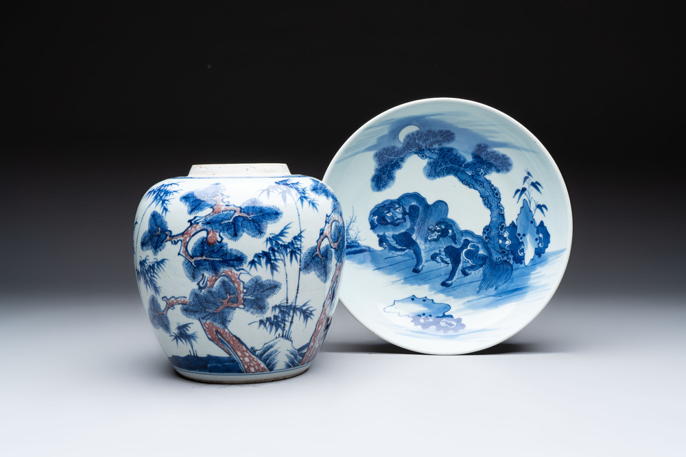 A Chinese blue, white and copper-red 'Three Friends of Winter' jar, and a blue and white 'Buddhist lion' dish, 18th C.