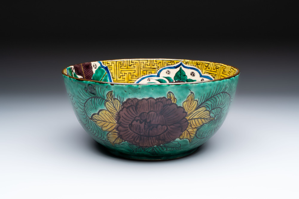 A Japanese  Kutani bowl with peonies and a mountainous landscape design, Kutani 九谷 mark, 19/20th C.