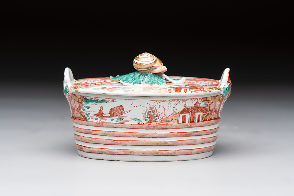 A Dutch Delft petit feu butter tub with a snail finial, 18th C.