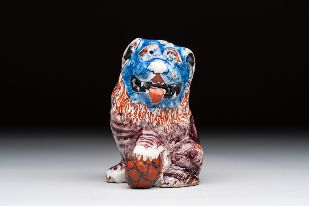 A polychrome Dutch Delft model of a lion, 18th C.