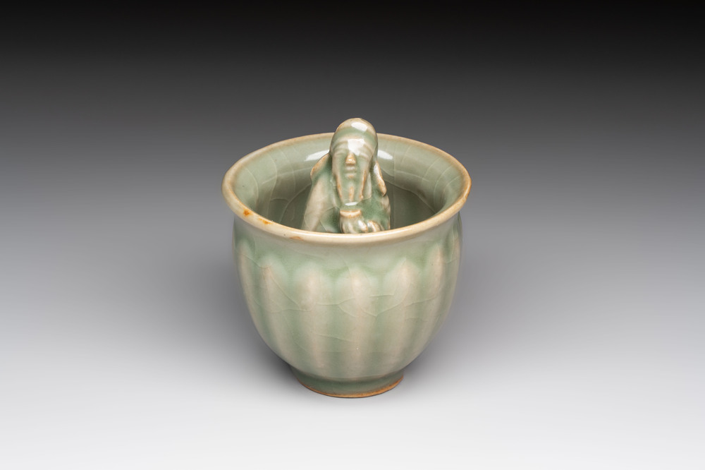 A Chinese Longquan celadon 'Trick Cup', Ming or later