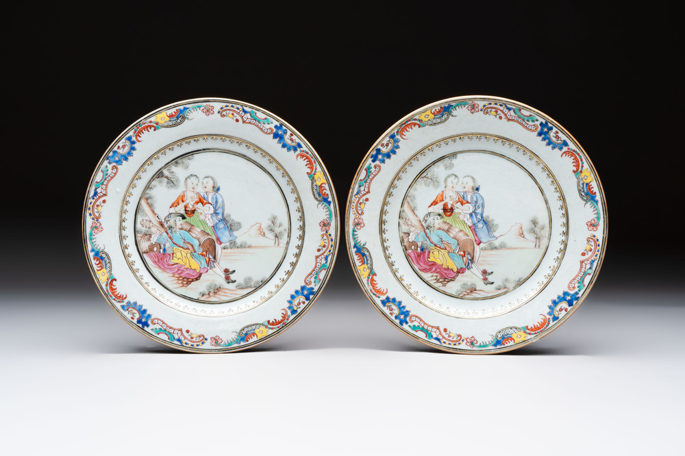 A fine pair of Chinese famille rose 'Autumn' plates with troubadours, Qianlong