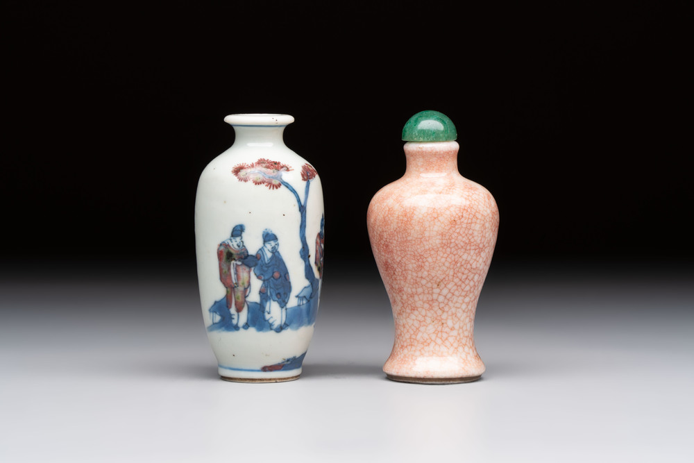 A Chinese peachbloom-crackle-glazed 'meiping' snuff bottle and a figural blue, white and copper-red snuff bottle, Yongzheng mark, 19th C.