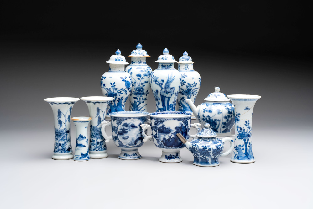 A varied collection of eight Chinese blue and white vases, two teapots and two loving cups, Kangxi/Qianlong