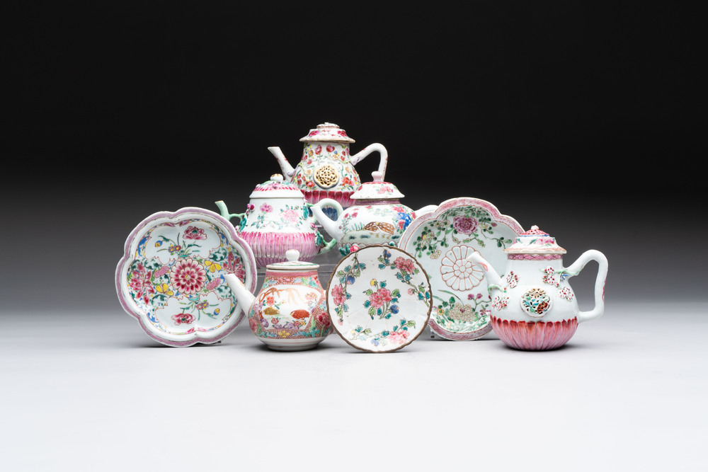 A group of five Chinese famille rose teapots and covers and three stands, Yongzheng/Qianlong