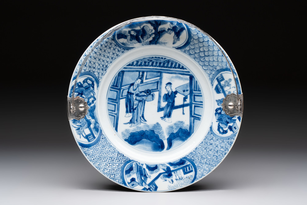 A Chinese blue and white 'Xi Xiang Ji' dish with silver mount, Kangxi mark and of the period