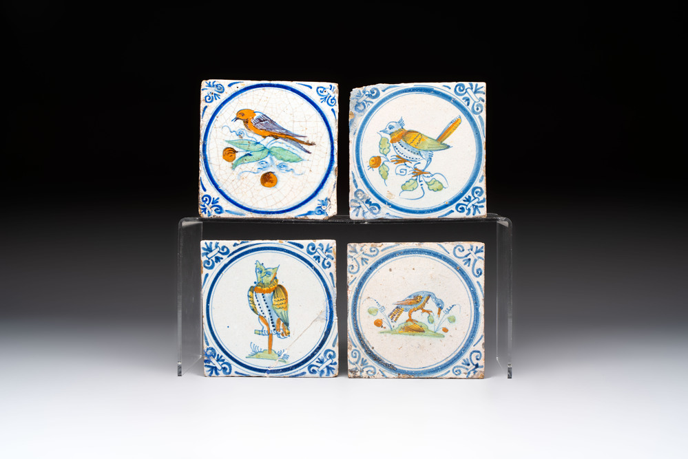 Four polychrome Dutch Delft 'bird' medallion tiles, 17th C.