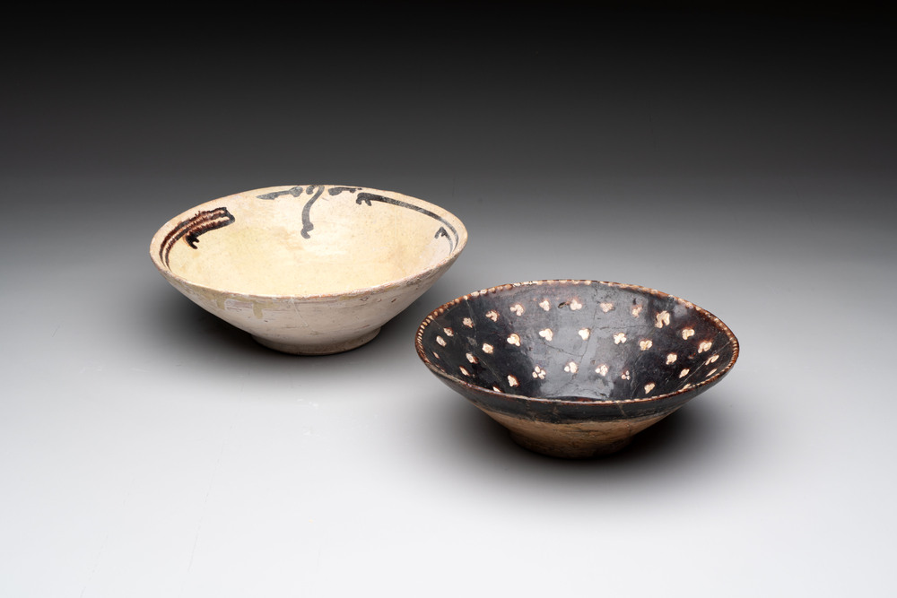 A Samanid pottery 'Kufic' inscribed bowl and a white-spotted brown-ground bowl, Iran, 10th C.