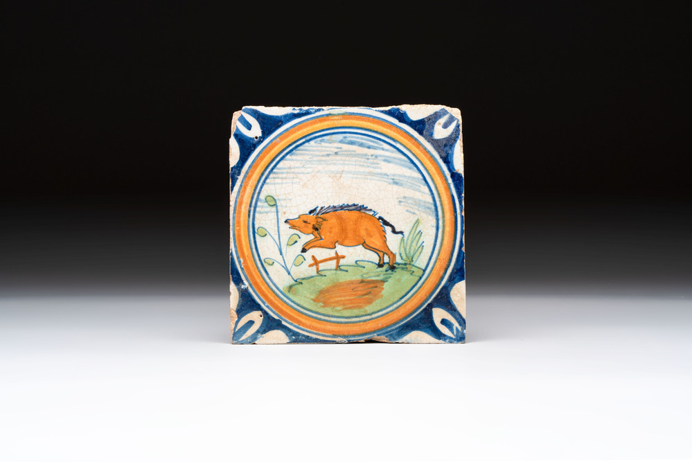 A polychrome Dutch Delft maiolica 'boar' tile, late 16th C.
