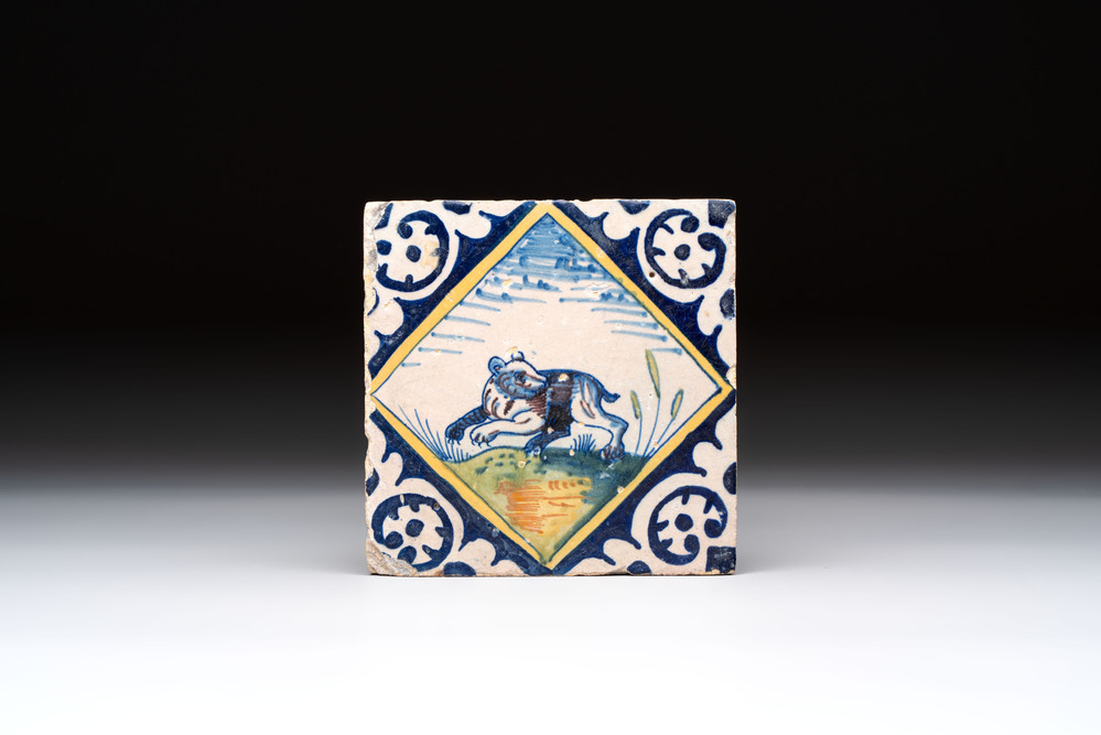 A polychrome Dutch Delft maiolica 'bear' tile, late 16th C.