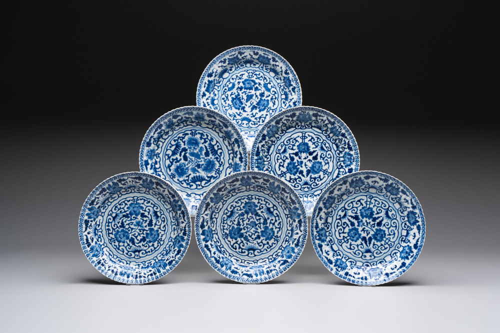 Six Chinese blue and white 'peony scroll' plates, Kangxi