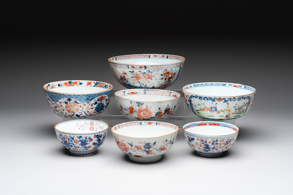 Seven Chinese Imari-style and famille rose bowls with floral and figural designs, 18th C.