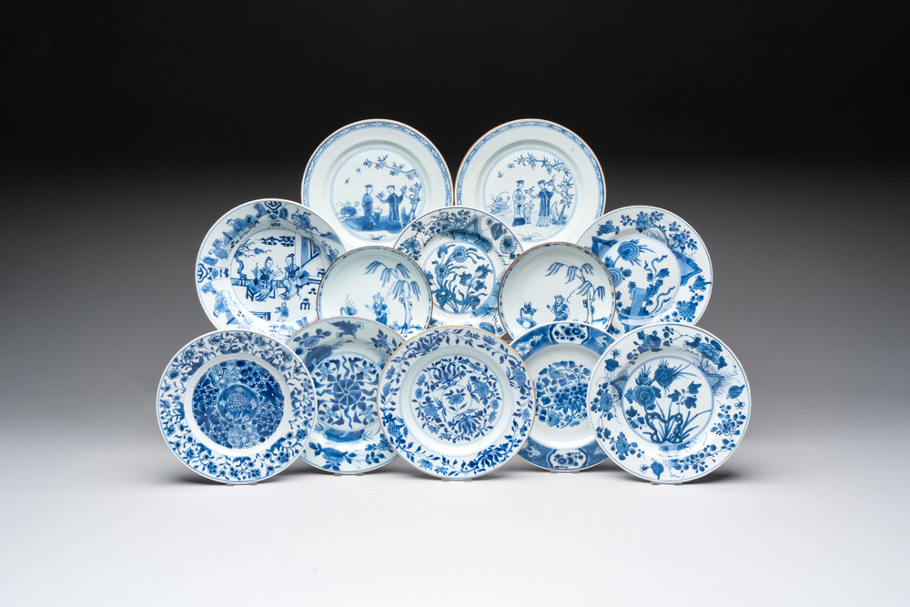 12 Chinese blue and white plates with figural and floral design, 18th C.