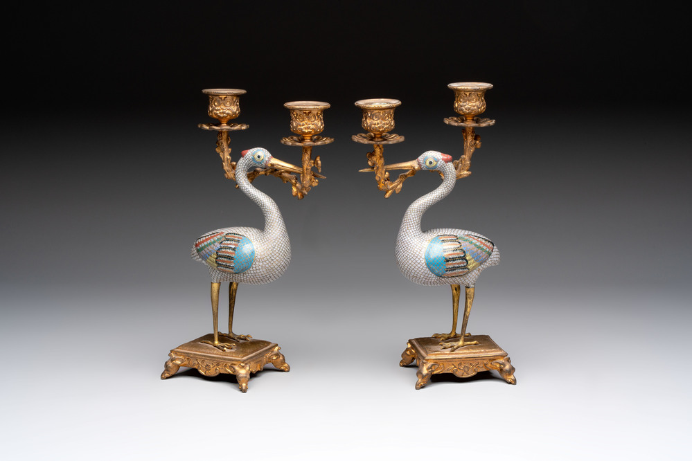 A pair of Chinese cloisonn&eacute; cranes, later mounted as candelabras, 19th C.