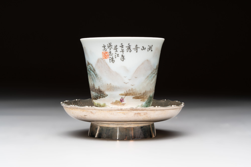 A fine Chinese famille rose 'Mountainous Landscape' cup on a silver stand, signed Zhang Zhitang 張志湯, dated 1942