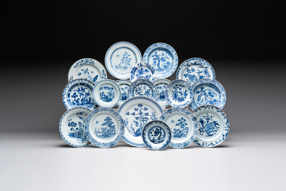 18 Chinese blue and white plates and saucers with floral design, 18th C.
