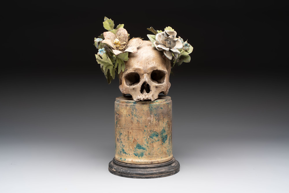 An Italian 'vanitas' or 'memento mori' skull mounted on wooden base, 19/20th C.