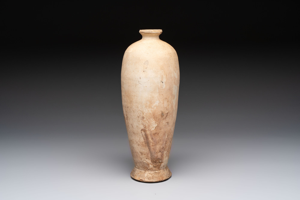 A Chinese Cizhou cream-glazed high-shouldered vase, Song/Jin