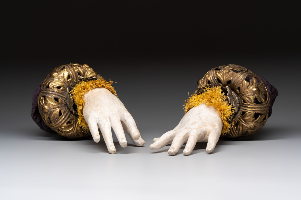 A pair of plaster hands with gilt-bronze cuffs and fabric adornments, Italy, 19th C.