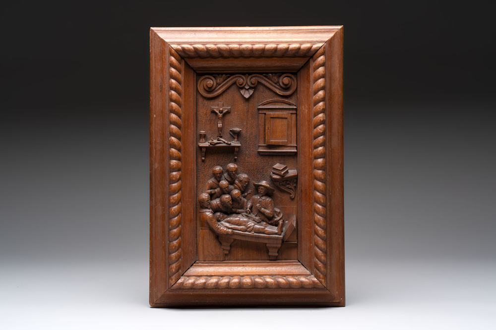 A high-relief wooden panel depicting Rembrandt's 'The Anatomy Lesson of Dr. Nicolaes Tulp', Germany, 19/20th C.