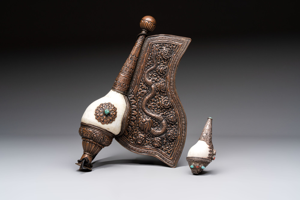 Two Tibetan brass and silver-mounted conch shell trumpets or 'Dung dkar', 19th C.