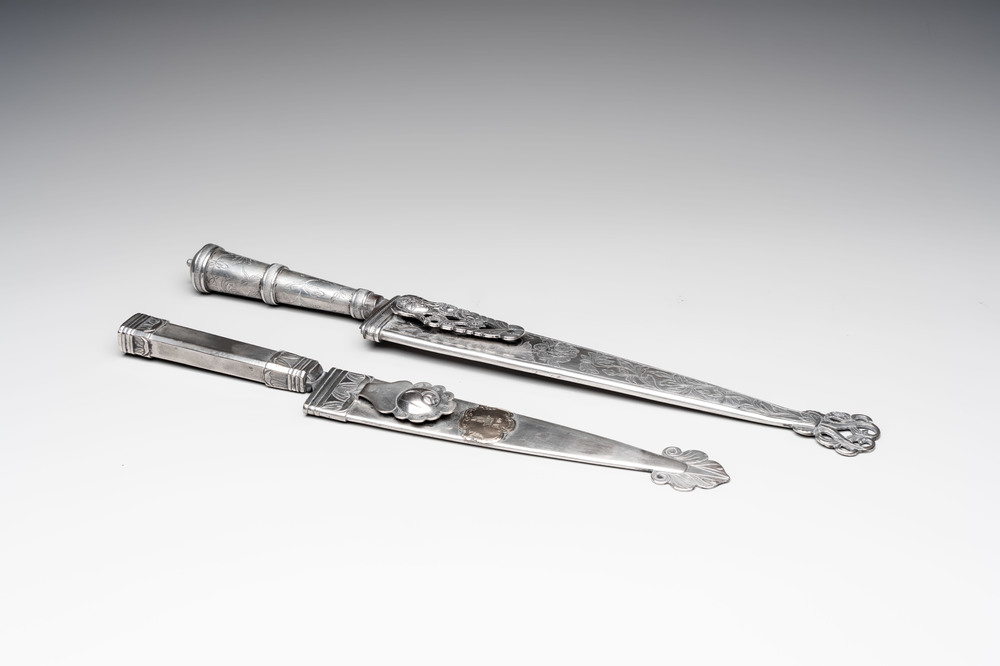 Two Argentinian silver gaucho knives with finely engraved design, 19th C.
