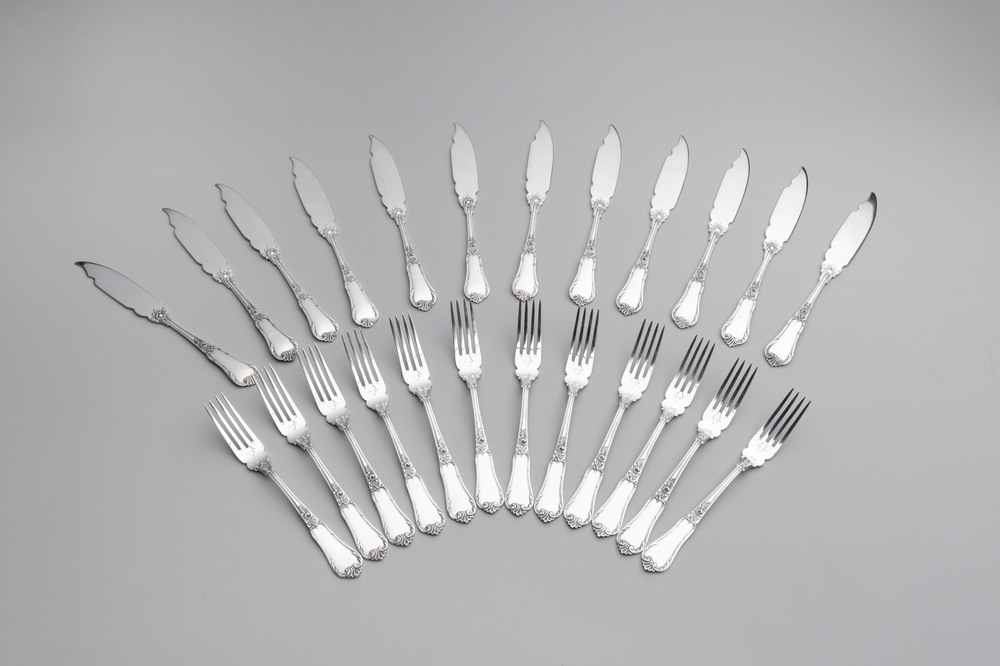 A set of 12 silver fish knives and twelve fish forks, 835/000, Wolfers Fr&egrave;res, Brussels, 20th C.