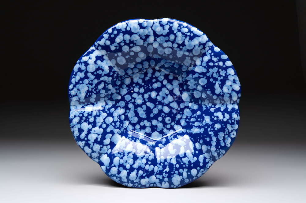 A Nevers white-splashed blue-ground '&agrave; la bougie' dish, France, late 17th C.
